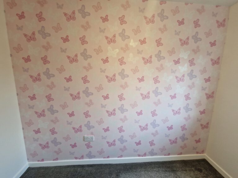 Pink butterfly wallpaper feature wall