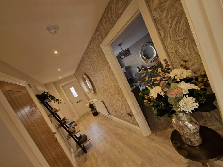 Entrance hall with marble-effect wallpaper